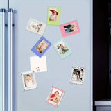 Colorful magnetic photo frames displayed on a refrigerator, showcasing a creative DIY arrangement for cherished memories.