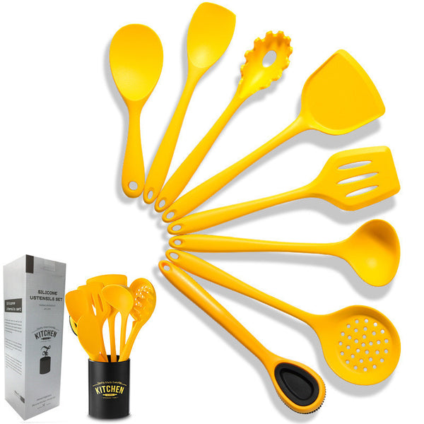 Nonstick yellow silicone cooking spoon spatula utensil set in modern style, perfect for cooking and baking.