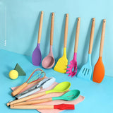 Colorful silicone kitchen utensils set with wooden handles on blue background, ideal for non-stick cooking and baking.