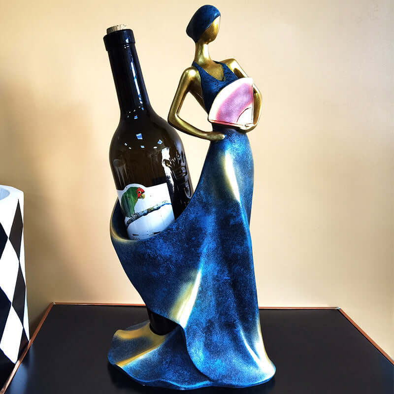Handmade resin wine rack ornament in blue and gold featuring a graceful figure holding a fan and a wine bottle.