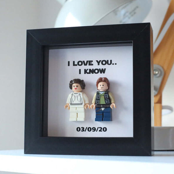 Personalized photo frame featuring Lego figures with the text 'I love you.. I know' and date '03/09/20'.