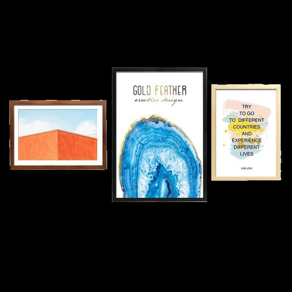 Three stylish solid wood picture frames displaying art prints, featuring a geometric photo and colorful inspirational quotes.