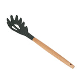 Silicone cooking utensil with wooden handle, featuring a unique spade design for scooping and serving food.