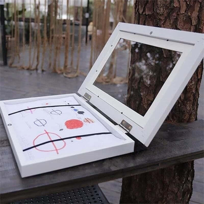 Modern rectangular acrylic art frame, ideal for showcasing children's art projects. Size: 26x35x4cm.