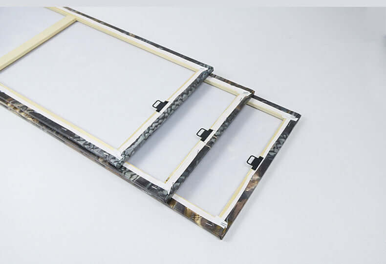 Three wooden canvas frames with a stylish design, perfect for decorating Nordic paintings.