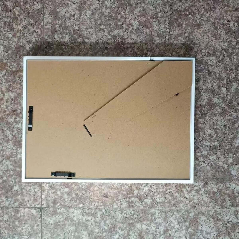 Back view of a rectangular acrylic photo frame for kids' art projects, showcasing modern simplicity and hanging options.