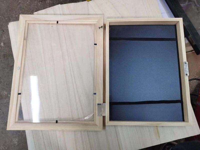 Children's art frame with a clear acrylic front and a black backing, showcasing modern rectangular design and simplicity.
