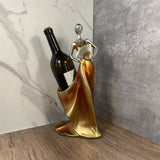 Elegant resin wine rack ornament in gold and orange, perfect for home decoration and showcasing your favorite bottle.