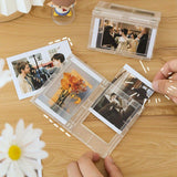 Creative magnetic small photo frames displaying mini pictures with flowers and people on a wooden table.