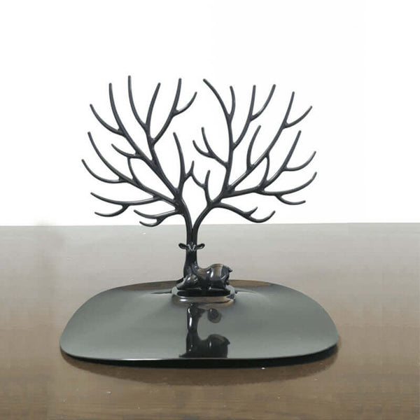 Stylish black metal tree-shaped jewelry display stand for earrings and necklaces.